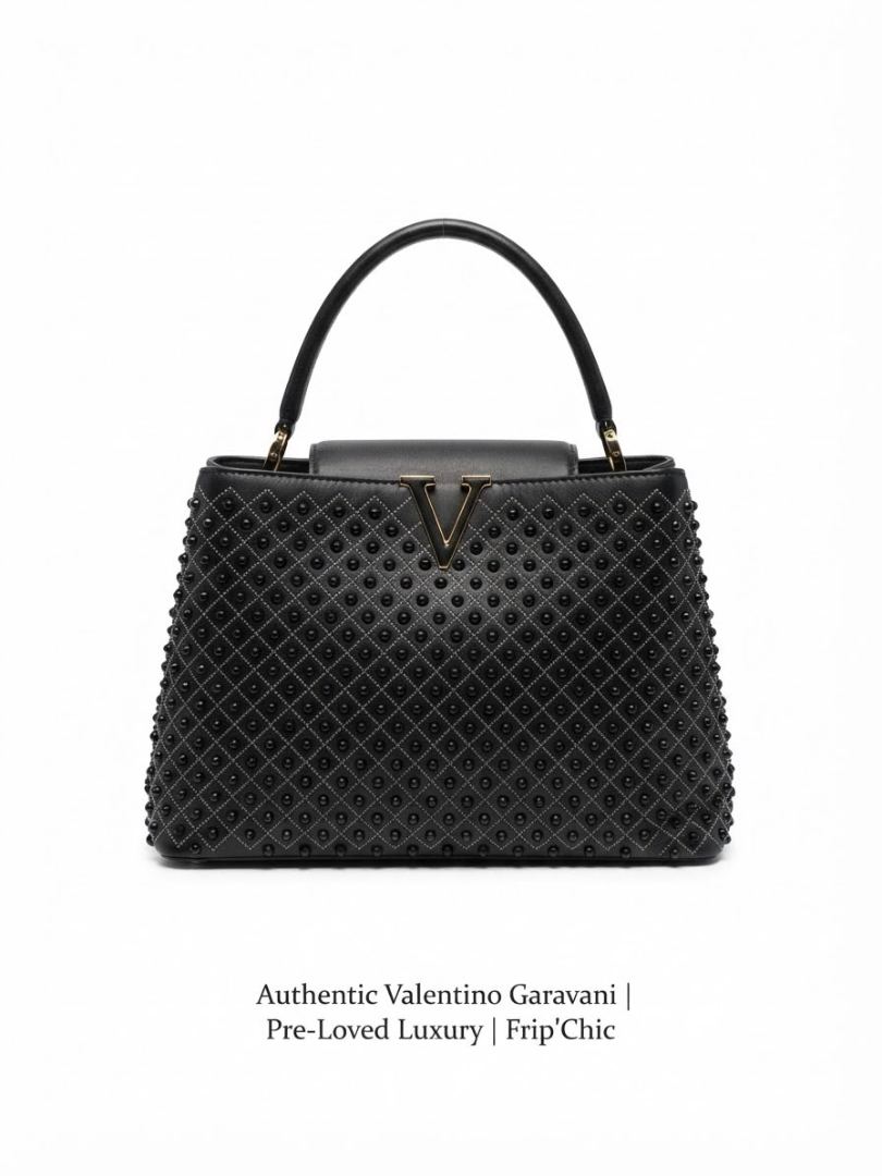 Il as un coup de Valentino un sac très chic - friperie — 1